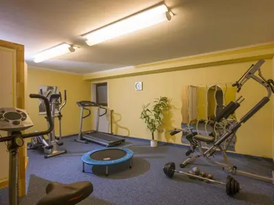 Das Fitnesscenter und/oder die Fitnesseinrichtungen in der Unterkunft Ferienwohnung Stigloher im Bergschlößl