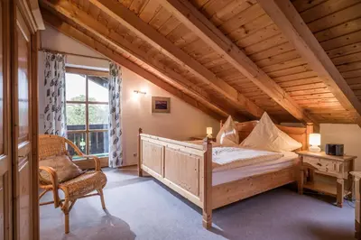 Ein Bett oder Betten in einem Zimmer der Unterkunft Mit einem Traumblick App 37
