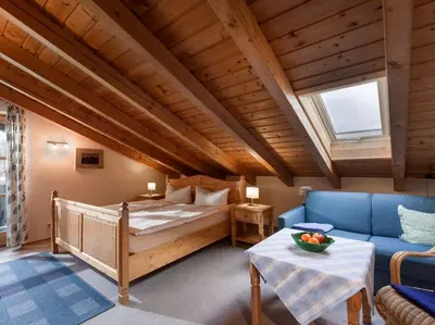 Ein Bett oder Betten in einem Zimmer der Unterkunft Mit einem Traumblick App 37