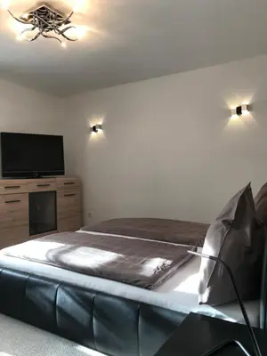 Ein Bett oder Betten in einem Zimmer der Unterkunft Appartement Am Goldbichl