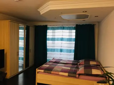 Ein Bett oder Betten in einem Zimmer der Unterkunft Ferienwohnung Dhillon