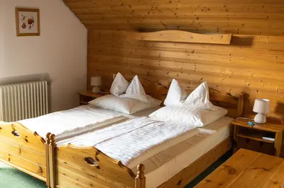 Ein Bett oder Betten in einem Zimmer der Unterkunft Gästehaus Eder