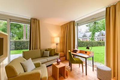 Ein Sitzbereich in der Unterkunft Parkhotel Rothof