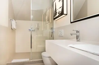 Ein Badezimmer in der Unterkunft Parkhotel Rothof