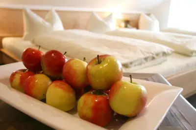 Ein Bett oder Betten in einem Zimmer der Unterkunft Gasthaus zur Linde