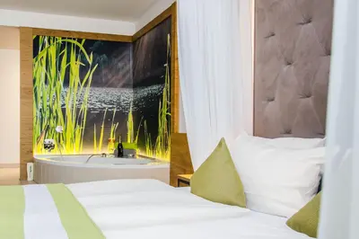 Ein Bett oder Betten in einem Zimmer der Unterkunft Gasthaus Forster am See - Eching bei Landshut