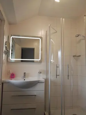 Ein Badezimmer in der Unterkunft Hotel Gasthof Momm