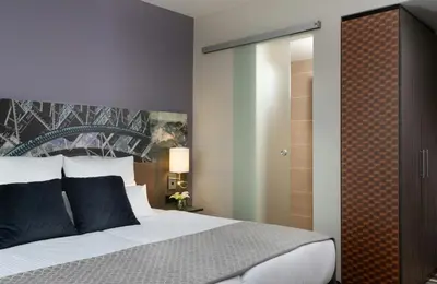 Ein Bett oder Betten in einem Zimmer der Unterkunft Leonardo Hotel Munich City East
