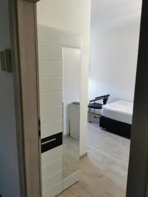 Ein Bett oder Betten in einem Zimmer der Unterkunft Pension Stamperl Bar