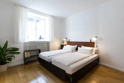 Ein Bett oder Betten in einem Zimmer der Unterkunft Vier Zimmer