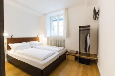 Ein Bett oder Betten in einem Zimmer der Unterkunft Vier Zimmer