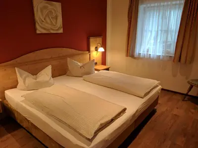Ein Bett oder Betten in einem Zimmer der Unterkunft Gasthaus Weingast