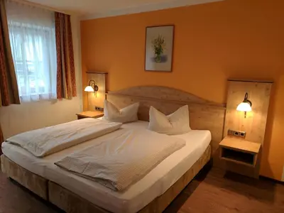 Ein Bett oder Betten in einem Zimmer der Unterkunft Gasthaus Weingast
