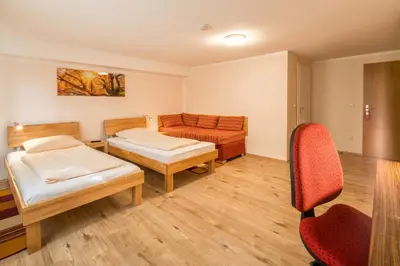 Ein Bett oder Betten in einem Zimmer der Unterkunft Hotel Bettstadl
