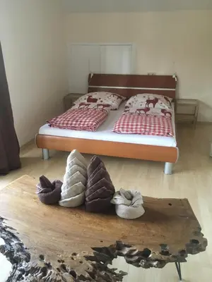 Ein Bett oder Betten in einem Zimmer der Unterkunft Fritz-Muller-Partenkirchen
