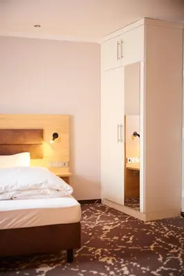 Ein Bett oder Betten in einem Zimmer der Unterkunft Bed&Breakfast Erber