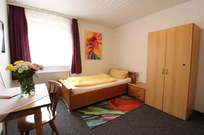 Ein Bett oder Betten in einem Zimmer der Unterkunft Zur Auszeit