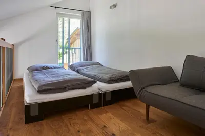 Ein Bett oder Betten in einem Zimmer der Unterkunft Ferienwohnungen am Lochbach