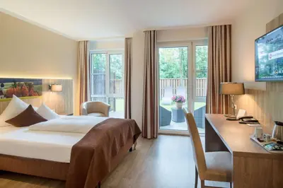Ein Bett oder Betten in einem Zimmer der Unterkunft Best Western Plus Parkhotel Erding