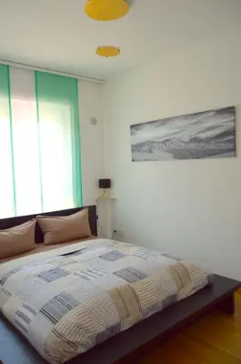 Ein Bett oder Betten in einem Zimmer der Unterkunft Yeti Lux - Central City Loft