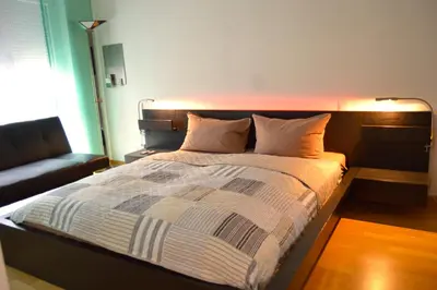Ein Bett oder Betten in einem Zimmer der Unterkunft Yeti Lux - Central City Loft