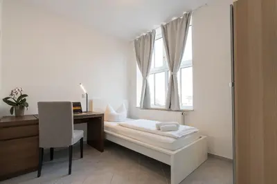 Ein Bett oder Betten in einem Zimmer der Unterkunft guenstigschlafen24 – die günstige Alternative zum Hotel
