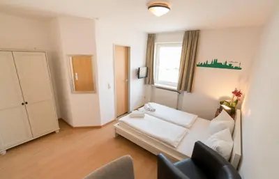 Ein Bett oder Betten in einem Zimmer der Unterkunft guenstigschlafen24 – die günstige Alternative zum Hotel