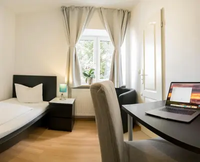 Ein Bett oder Betten in einem Zimmer der Unterkunft guenstigschlafen24 – die günstige Alternative zum Hotel