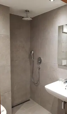 Ein Badezimmer in der Unterkunft Apparthotel Garni Superior Simsseeblick