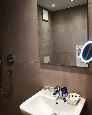 Ein Badezimmer in der Unterkunft Apparthotel Garni Superior Simsseeblick