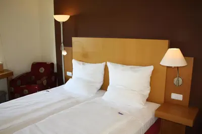 Ein Bett oder Betten in einem Zimmer der Unterkunft Pension Geno