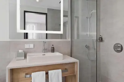 Ein Badezimmer in der Unterkunft Stellaris Apartment Hotel