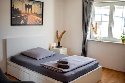Ein Bett oder Betten in einem Zimmer der Unterkunft BoardingHouse Neuburg