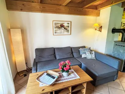 Ein Sitzbereich in der Unterkunft Holiday Home Chalet Walchsee by Interhome