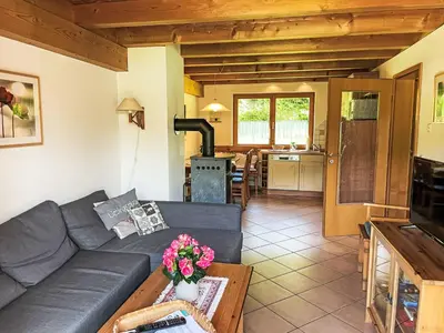 Ein Sitzbereich in der Unterkunft Holiday Home Chalet Walchsee by Interhome