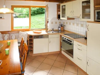 Küche/Küchenzeile in der Unterkunft Holiday Home Chalet Walchsee by Interhome