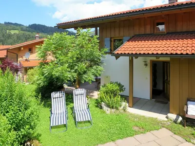 Ein Garten an der Unterkunft Holiday Home Chalet Walchsee by Interhome