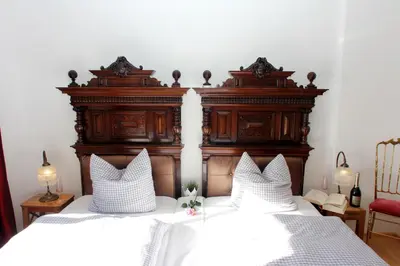 Ein Bett oder Betten in einem Zimmer der Unterkunft Ultra Alpes Ludwig Suite
