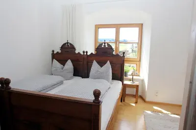 Ein Bett oder Betten in einem Zimmer der Unterkunft Ultra Alpes Ludwig Suite