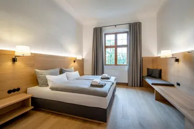 Ein Bett oder Betten in einem Zimmer der Unterkunft Kloster Seeon
