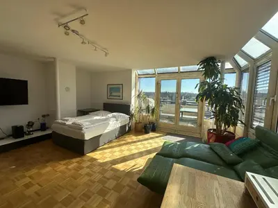 Ein Bett oder Betten in einem Zimmer der Unterkunft Pegasus Penthouse