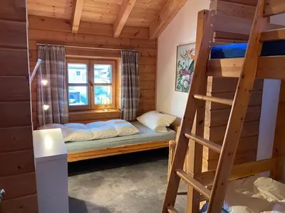 Ein Bett oder Betten in einem Zimmer der Unterkunft Ferienhaus Wilder Kaiser