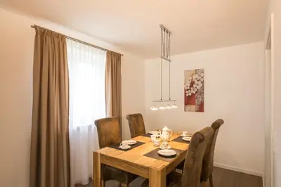 Ein Sitzbereich in der Unterkunft Ferienhaus Villa Alpenpanorama