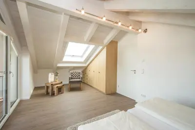 Ein Bett oder Betten in einem Zimmer der Unterkunft Ferienhaus Villa Alpenpanorama