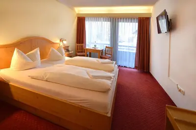 Ein Bett oder Betten in einem Zimmer der Unterkunft Gasthof Hotel zur Post
