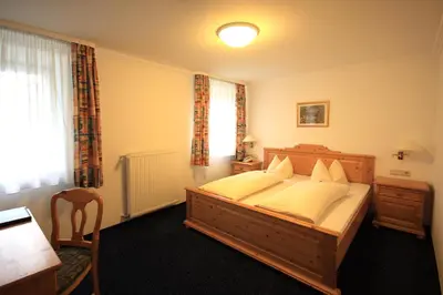 Ein Bett oder Betten in einem Zimmer der Unterkunft Hotel Trasen