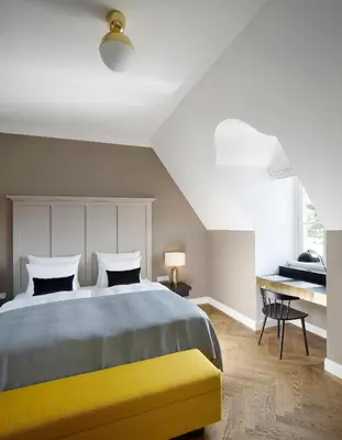 Ein Bett oder Betten in einem Zimmer der Unterkunft Das Tegernsee