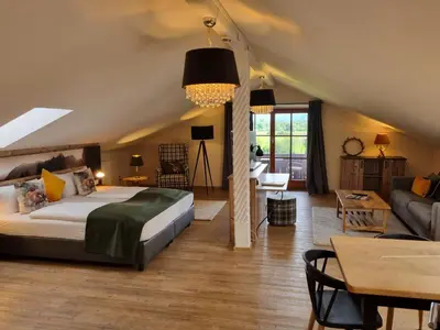 Ein Bett oder Betten in einem Zimmer der Unterkunft Gasthof Chiemseefischer