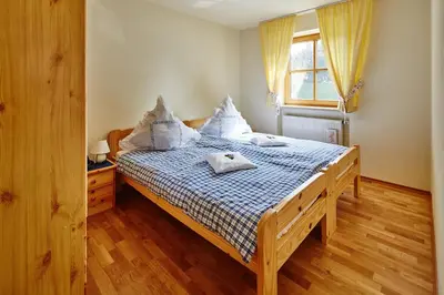 Ein Bett oder Betten in einem Zimmer der Unterkunft Sonne in Gasteig