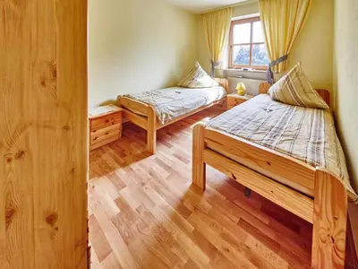 Ein Bett oder Betten in einem Zimmer der Unterkunft Sonne in Gasteig